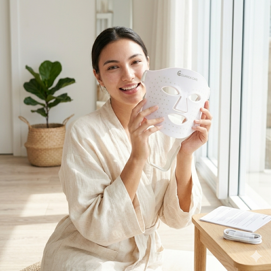 Full Guanda Care LED beauty tool set including face mask and wand on a luxury beige surface